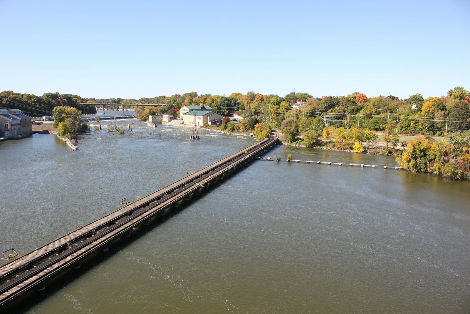 Overview from Oneida Street Bridge.  C&NW bridge in front, Milwaukee Road bridge in back